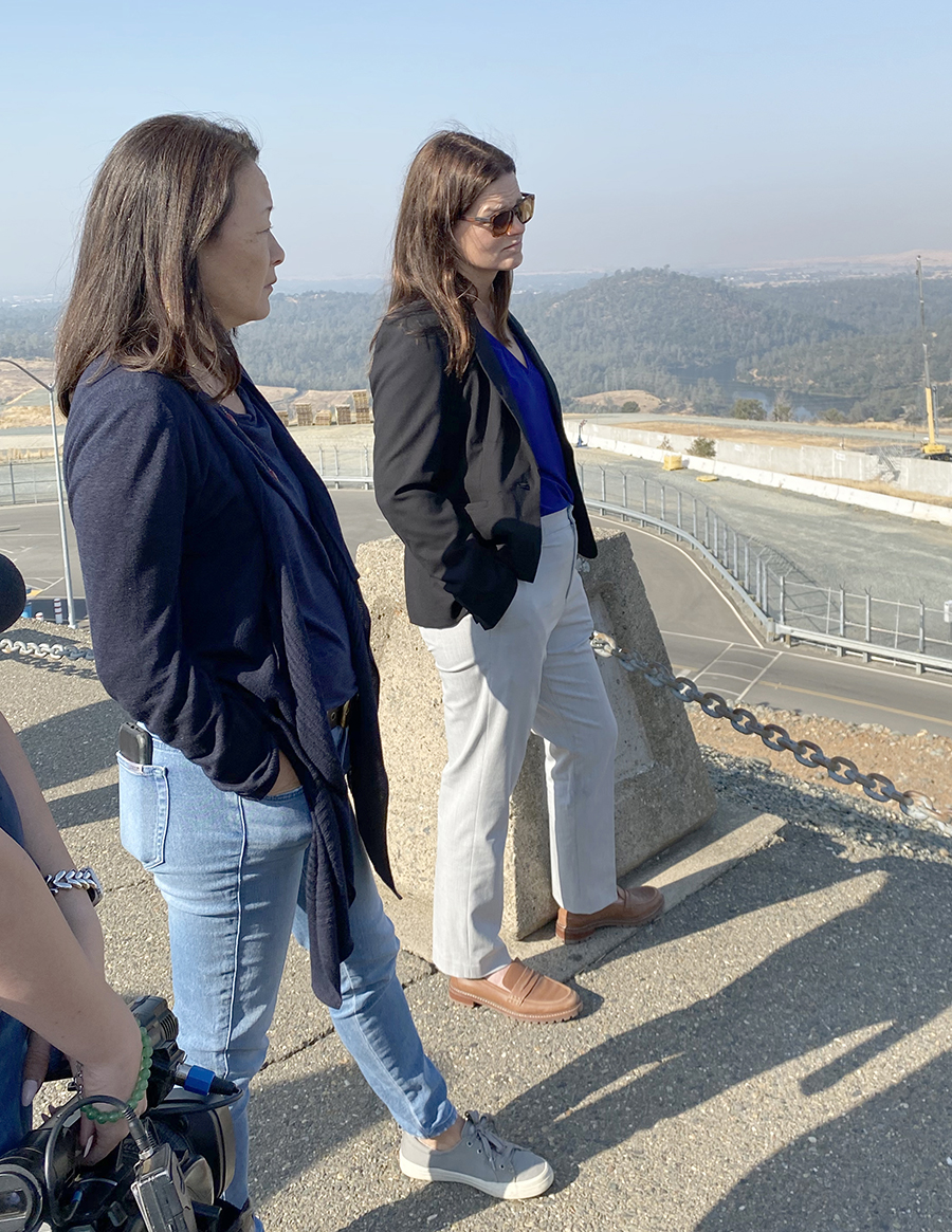 California Water Commissioners Sandi Matsumoto, left, and Kim Gallagher, on the Oroville Dam, overlooking the main spillway.  