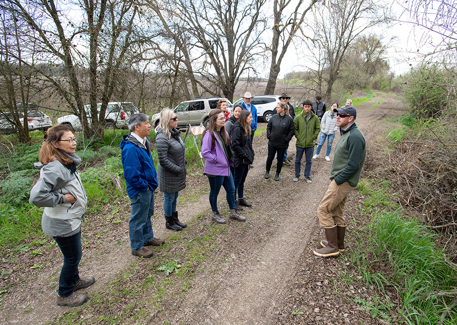 California Water Commissioner Carol Baker, far left, attends a tour of the Oneto-Denier Floodplain Restoration Project in the Cosumnes River Watershed near Galt, led by Field and Lab Director Carson Jeffres, PhD, far right, of the Center for Watershed Sciences, University of California, Davis.
