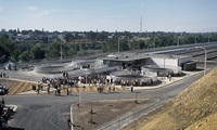 Hundreds gathered in front of the hatchery spawning building for the Dedication Ceremony for the Feather River Fish Hatchery in Oroville, California. The Salmon and Steelhead hatchery is operated by the California Department of Fish and Game and funded by the Department of Water Resources. Photo taken October 11, 1967.