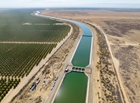 With a view in Kern County, the 444-mile-long California Aqueduct transports water throughout California.