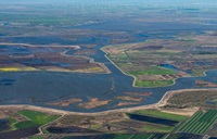 Aerial view looking east at the S Bacon Island road bridge connecting the Northern end of Bacon Island (Left) and Southern end of Mandeville Island (right),  both part of the Sacramento-San Joaquin River Delta in San Joaquin County, California. Photo taken March 08, 2019.
