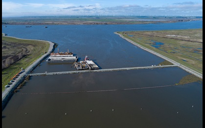 This drone photograph shows construction crews notching this Emergency Drought Salinity Barrier on the West False River near Oakley in the Sacramento-San Joaquin Delta in Contra Costa County. 