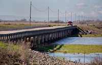 View of the West Washington Road Bridge over the high water in the Eastside Bypass in Merced County. A series of atmospheric river storms hit California during Jan. 2017, causing near record amounts of rainfall and snow. .