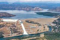 An aerial view shows high water conditions at Oroville Dam located at Lake Oroville in Butte County, California. Photo taken June 12, 2023.