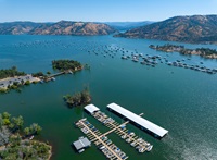 An aerial view shows high water conditions at Bidwell Canyon Marina on Lake Oroville. Photo taken July 3, 2023.