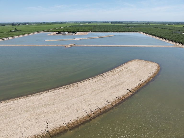A drone photo of water diverted onto a newly constructed groundwater recharge basin at Mountain View and Temperance near Selma in Fresno County, California. Photo taken May 13, 2024.
