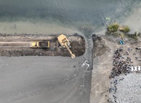 The California Department of Water Resources (DWR) and Ecosystem Investment Partners (EIP) hold a levee breaching ceremony to celebrate the completion of the Lookout Slough Tidal Habitat Restoration Project in Solano County. The levee will be breached in nine places, creating an open water habitat for fish and wildlife in the Sacramento-San Joaquin Delta. Photo taken September 18, 2024. 