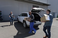 DWR staff donate 430 masks and 9800 gloves at the UC Davis Medical Center receiving supply warehouse on April 1, 2020.
