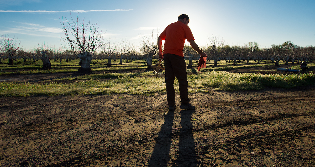 Glen Gordon, engineering geologist with the California Department of Water Resources, cleans the tape used to measure the water depth at specific agricultural wells in Colusa County on March 17, 2016.  Measuring and recording takes place a couple times a year throughout the state at multiple locations to help develop databases for groundwater levels, and report hydrologic data and historic groundwater levels.