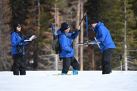 DWR staff conduct the third snow survey of the season at Phillips Station on March 3, 2023.
