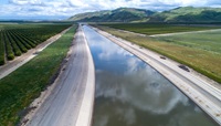A drone provides a view of a section of the California Aqueduct within the California State Water Project, located near John R. Teerink Pumping Plant, which convey California Aqueduct water between Buena Vista and John R. Teerink Pumping Plants within Kern County. 
