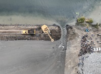 The California Department of Water Resources (DWR) and Ecosystem Investment Partners (EIP) hold a levee breaching ceremony to celebrate the completion of the Lookout Slough Tidal Habitat Restoration Project in Solano County. The levee will be breached in nine places, creating an open water habitat for fish and wildlife in the Sacramento-San Joaquin Delta. Photo taken September 18, 2024.