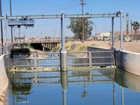 An automated trash screen at the border in the New River in Calexico allows for the removal of debris.
